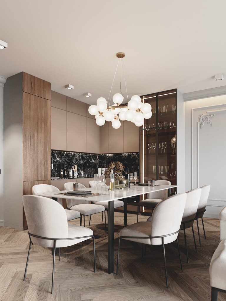 Salon z aneksem kuchennym w bloku, jasna zabudowa i okrągły stół w nowoczesnej aranżacji – Golden Room