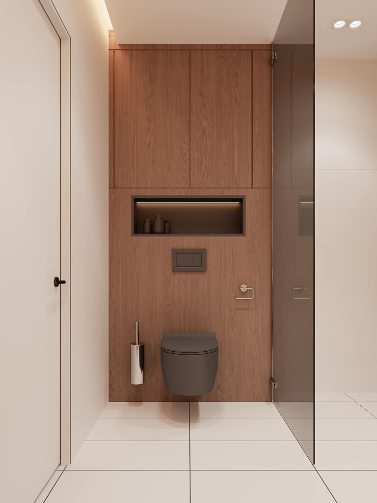 Łazienka 7m2 z wiszącym WC na tle pełnej drewnianej zabudowy, podświetlaną wnęką na kosmetyki i szklaną ścianką oddzielającą strefę prysznica